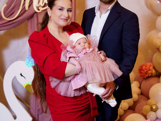 Cine cumpara trusoul de botez?